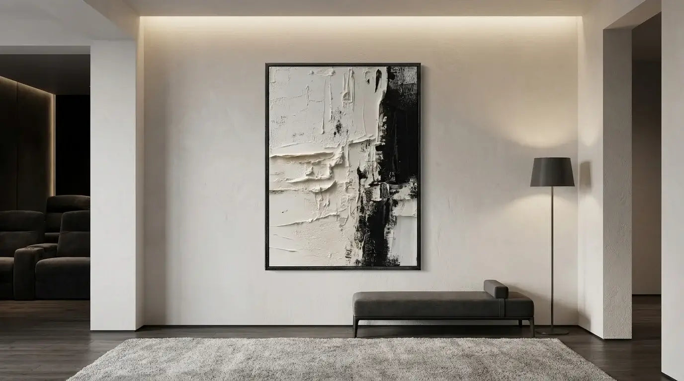 Modern interior with abstract art on a wall, a bench, and a floor lamp.