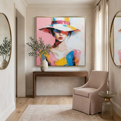 Modern interior with abstract art, console table, and chair.