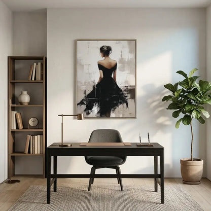 Modern home office with a desk, chair, bookshelf, and framed artwork on the wall.
