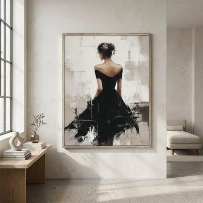 Framed artwork of a woman in a black dress on a wall in a modern room.
