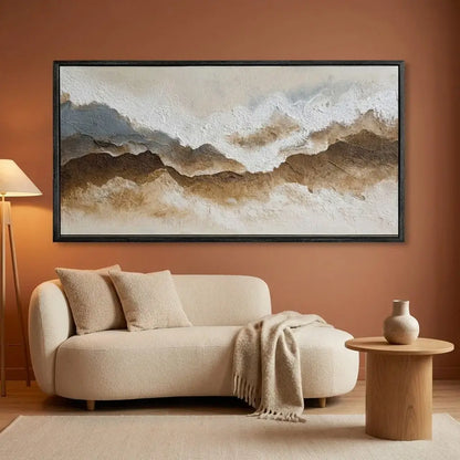 Living room with a beige sofa, wooden side table, and abstract mountain painting on an orange wall.